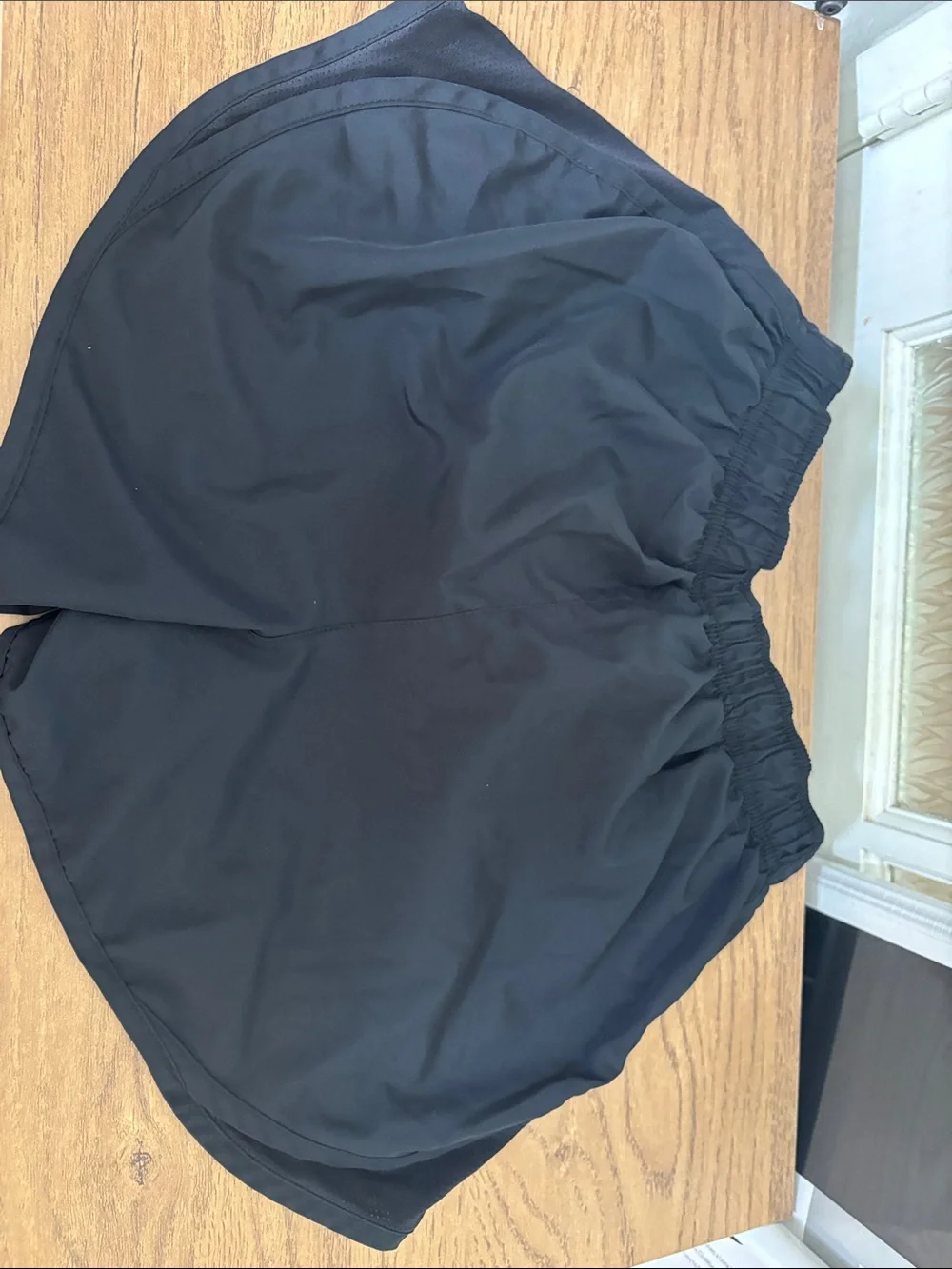 Nike Black Athletic Shorts with White Swoosh